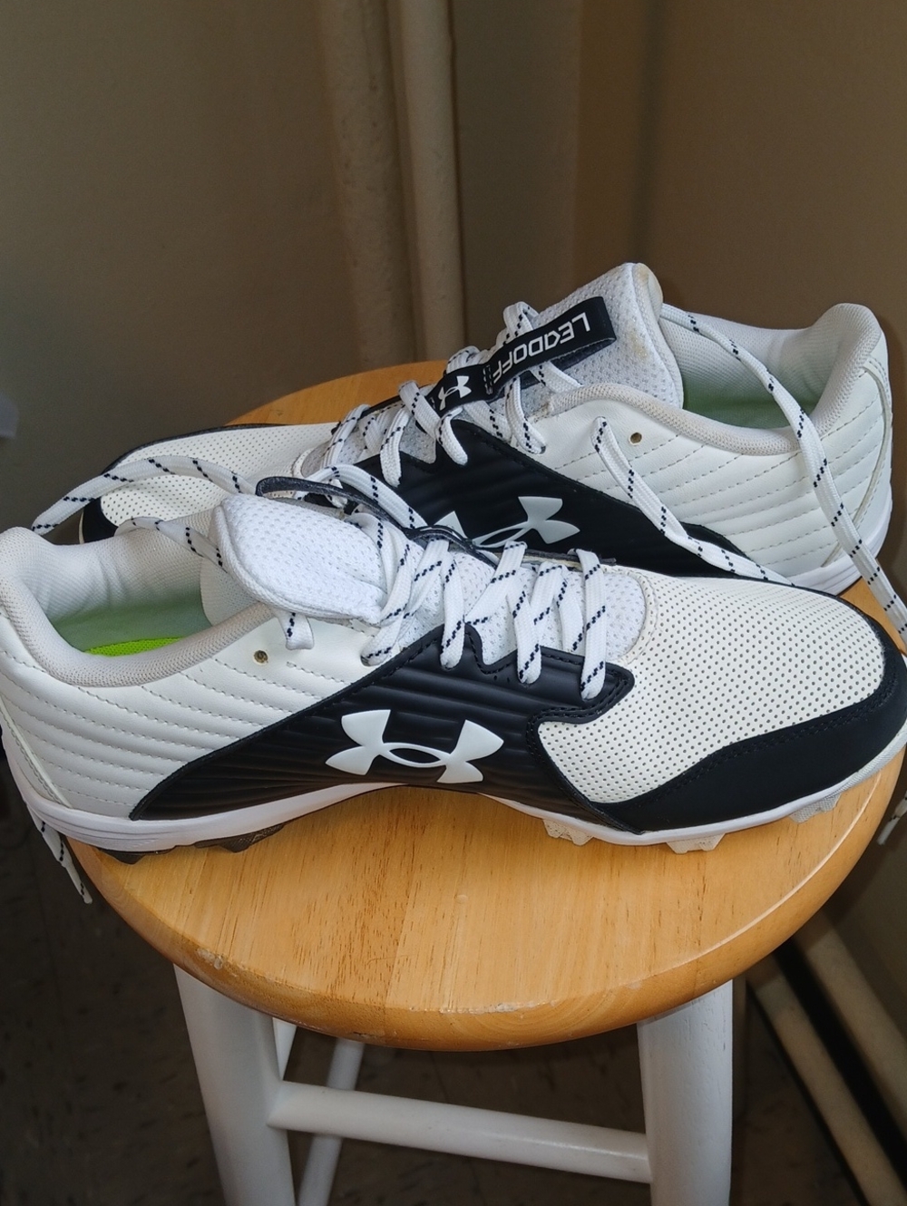 Under Armour Men’s White and Black Athletic Cleats
